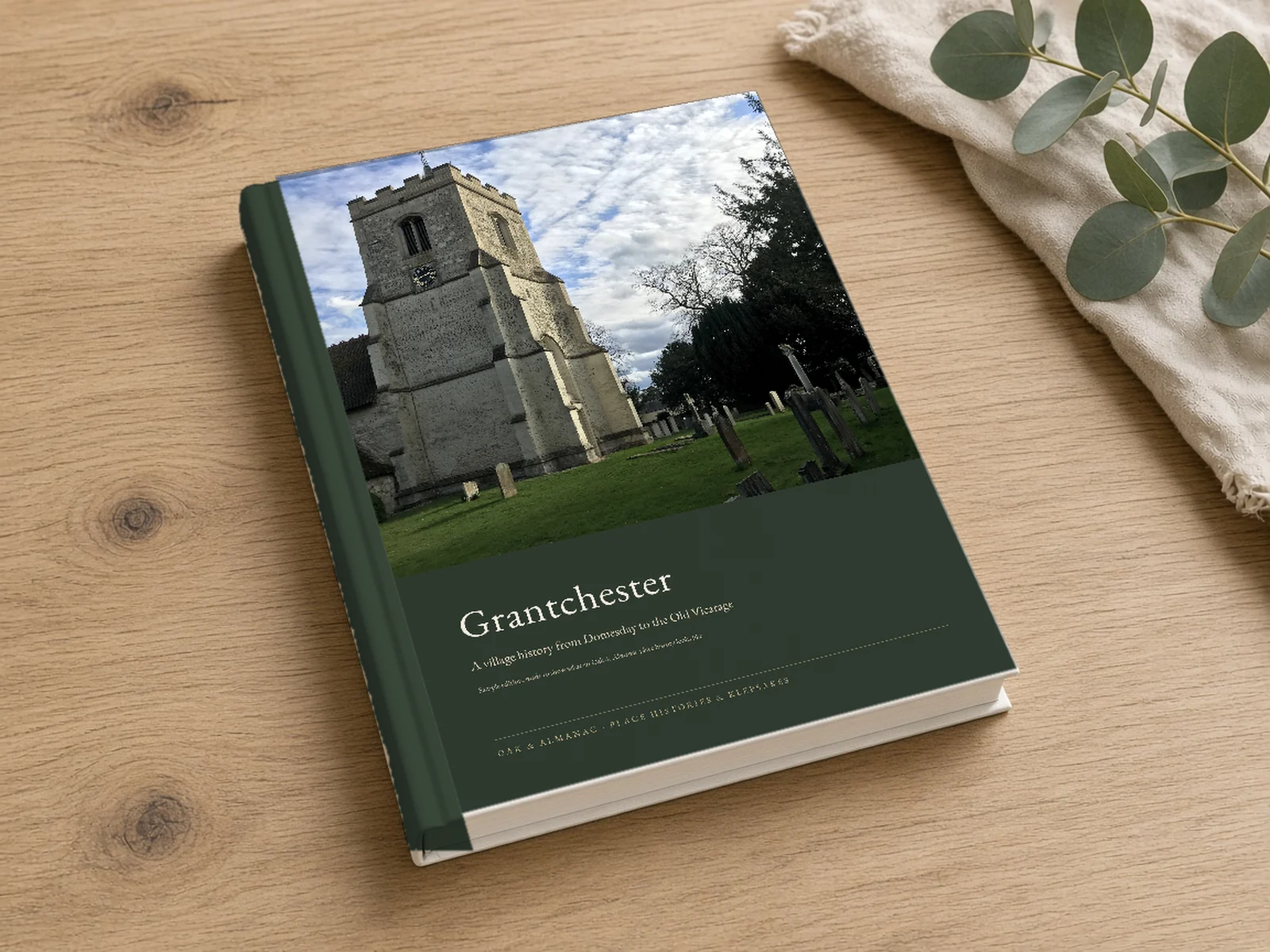 Mock-up of our Grantchester village edition sample as an A4 hardback, with the cover from its print file: a photograph of the parish church