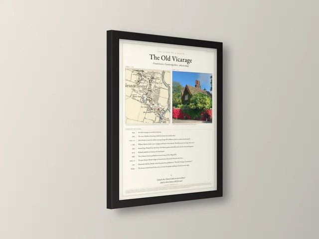 The Street Through Time example print in the black 30×40 cm frame, seen from an angle to show the frame depth
